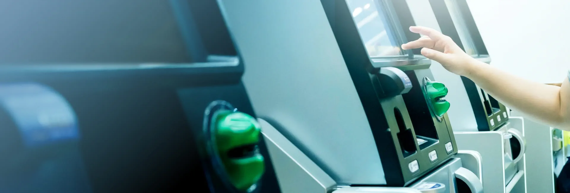 person is taking out money from atm