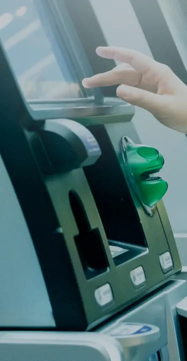 person is taking out money from atm