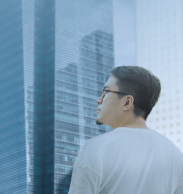 asian guy is happy after investing in rhb retail bond investment